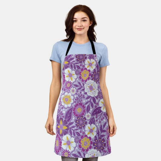 紫、黄、マゼンタのフローラ エプロン (着用した状態)