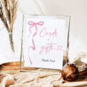 結びカードとGIftsサインを結ぶピンクの弓 ポスター