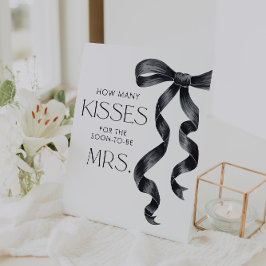 結び目の数を推測するキス 台座サイン