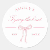 結び目を結ぶピンクの弓 ラウンドシール (正面)