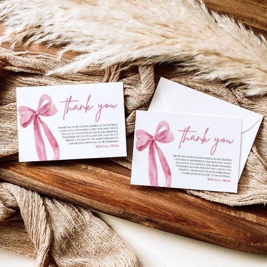 結び目を結んでいるピンクボウサンキューカード 招待状