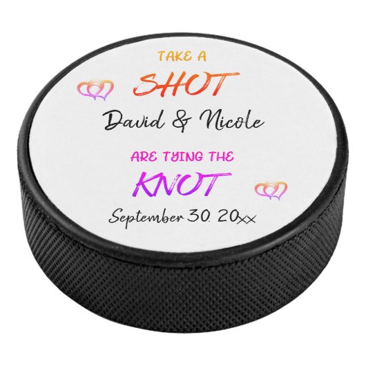 結び目を結婚約したぶカップルを撮影する アイスホッケーパック (3/4)