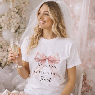 結婚式のピンクのリボン パール バチェロレッテ Tシャツ