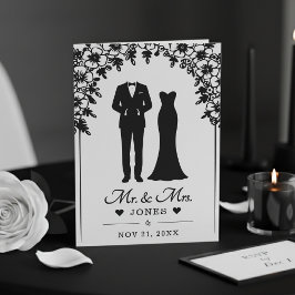 結婚式の新郎新婦 ウェディングドレス タキシード 花のアーチの写真 プログラム