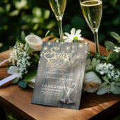 結婚式の為のワインチャンピンググラスと木製ライト セーブザデート