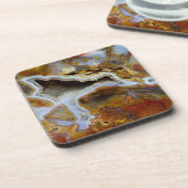 結晶を有する石化木材 コースター (左側)