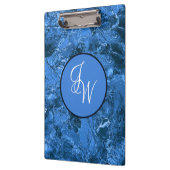 絡み合ったスタイリッシュイニシャルで青く染まる クリップボード (左)