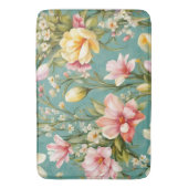 絶妙なピンクと黄色のマグノリアと白い花 バスマット (正面縦)