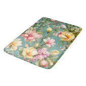 絶妙なピンクと黄色のマグノリアと白い花 バスマット (アングル)