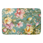 絶妙なピンクと黄色のマグノリアと白い花 バスマット (正面)