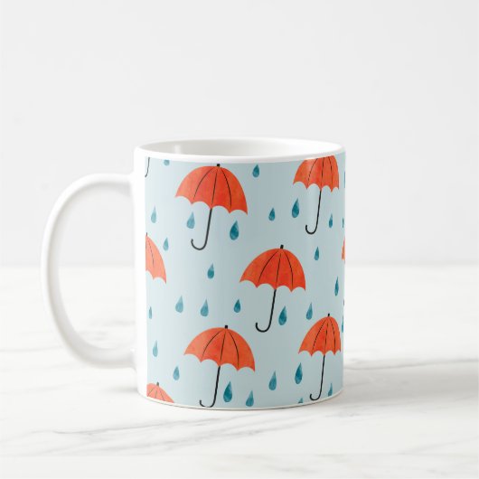 継ぎ目のない傘と雨粒の模様。ウォーターコ コーヒーマグカップ (左)