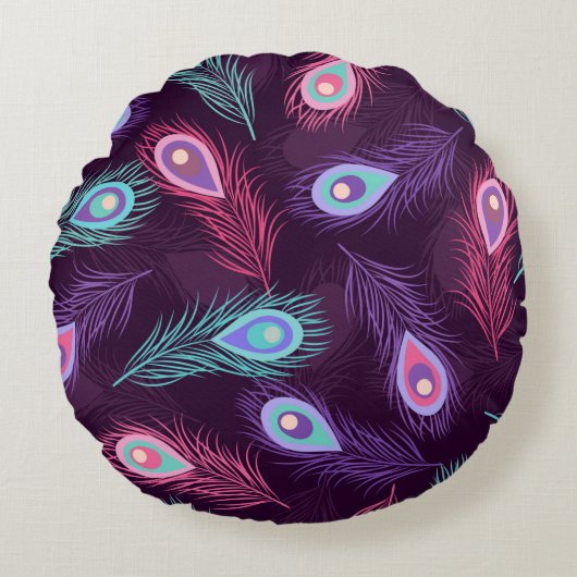 継ぎ目のない手で孔雀の羽模様を描く。ビント ラウンドクッション (正面)