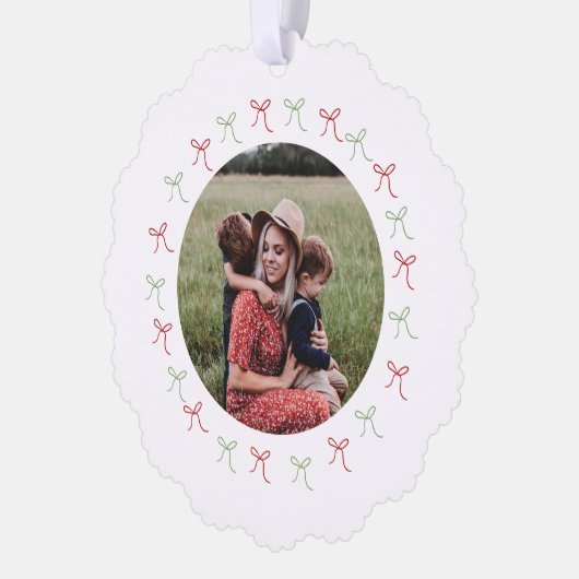 緑お洒落と赤の手描き弓フレームの写真 オーナメントカード (左)