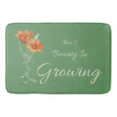 緑とオレンジに美しいが生えている バスマット (正面)