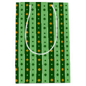 緑とオレンジのアイルランドのシャムロックの列 ミディアムペーパーバッグ (正面)