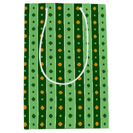 緑とオレンジのアイルランドのシャムロックの列 ミディアムペーパーバッグ