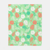 緑とオレンジの熱帯の葉のパターン フリースブランケット (正面)