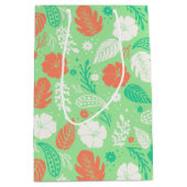 緑とオレンジの熱帯の葉のパターン ミディアムペーパーバッグ (正面)