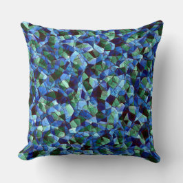 緑と青の不規則なモザイクが重ねられた乱雑な クッション