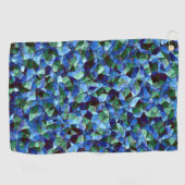 緑と青の不規則なモザイクが重ねられた乱雑な ゴルフタオル (横)