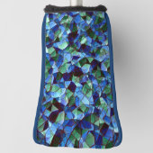 緑と青の不規則なモザイクが重ねられた乱雑な ゴルフヘッドカバー (回転90)