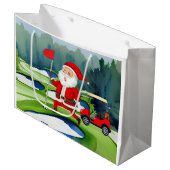 緑に赤いカートを持つゴルフクリスマスサンタクロース ラージペーパーバッグ (正面アングル)