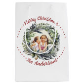 緑に輝くリースの写真とクリスマス ミディアムペーパーバッグ (正面)