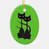 緑に長い首を持つ黒猫たち セラミックオーナメント (裏面)