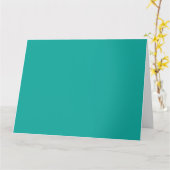 緑に青をブレンドしたグラデーション背景。 カード (黄色い花)