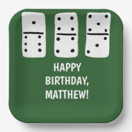 緑に黒い点を持つ白いドミノ ペーパープレート