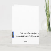 緑のカードにシャムロックを付けたブロンドの子供 カード (裏面)