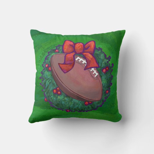 緑のクリスマスリースのサッカー クッション (裏面)