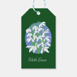 緑のソフトブルーの楕円形の背景に雪が降る ギフトタグ