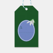 緑のソフトブルーの楕円形の背景に雪が降る ギフトタグ (裏面)