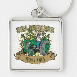 緑のトラクターが付いているまだ演劇 キーホルダー