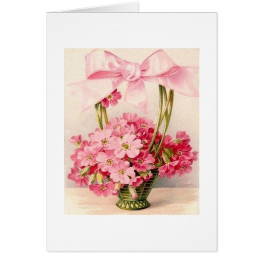 緑のバスケットの美しいヴィンテージのピンクの花 (正面)