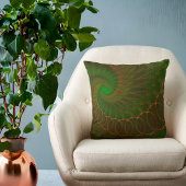 緑のフラクタル上のオレンジ色のスパイラル クッション