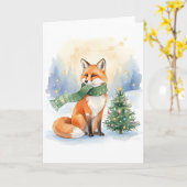 緑のマフラーとクリスマスツリーの冬の狐 カード (黄色い花)