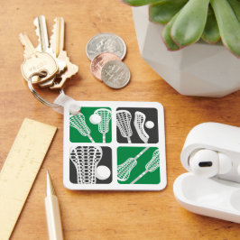 緑のラクロスブロックの棒とボール キーホルダー