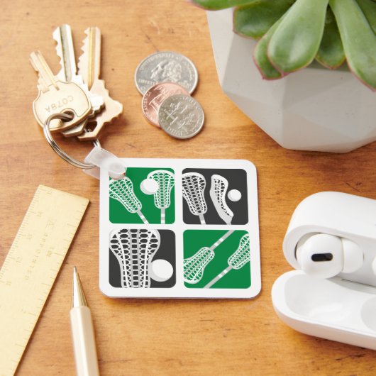 緑のラクロスブロックの棒とボール キーホルダー (デスク)