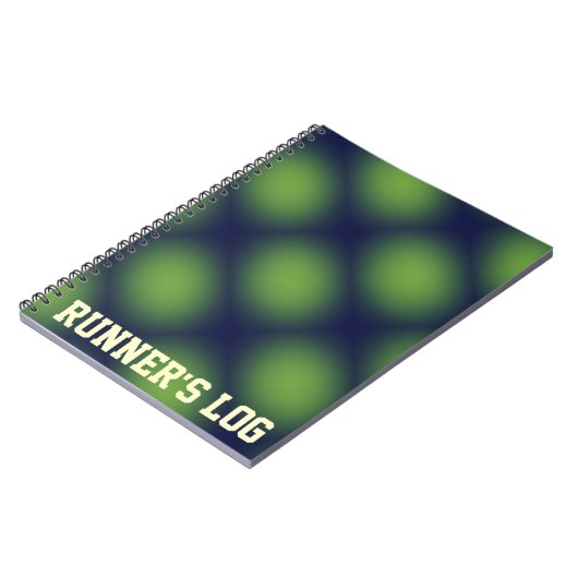 緑のランナーの丸太の連続したノートの螺線形ジャーナル ノートブック (左側)