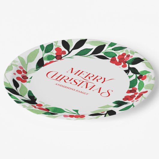 緑のリースと赤葉の実を持つクリスマス ペーパープレート (アングル)