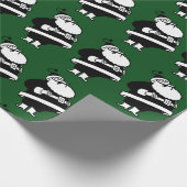緑のヴィンテージの黒い及び白人の笑うサンタ ラッピングペーパー (角)