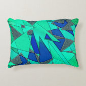 緑の三角形の切り出し、青い背景、粗い アクセントクッション (正面)