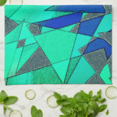 緑の三角形の切り出し、青い背景、粗い キッチンタオル (折り畳み)