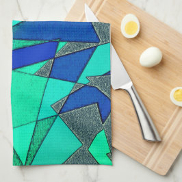 緑の三角形の切り出し、青い背景、粗い キッチンタオル