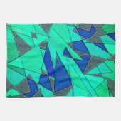 緑の三角形の切り出し、青い背景、粗い キッチンタオル (横)