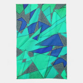 緑の三角形の切り出し、青い背景、粗い キッチンタオル (縦)