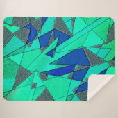 緑の三角形の切り出し、青い背景、粗い シェルパブランケット (正面(横))