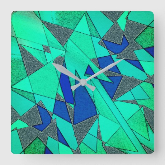 緑の三角形の切り出し、青い背景、粗い スクエア壁時計 (正面)